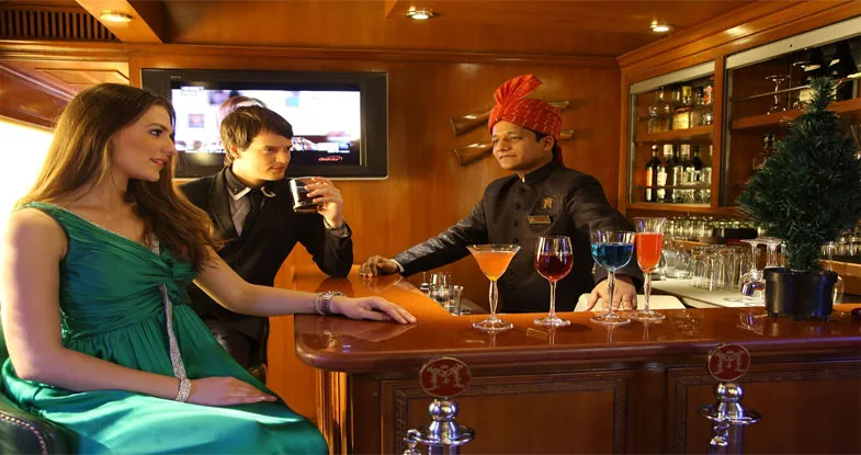 Tourist at Maharaja Express Luxury Train Bar Image